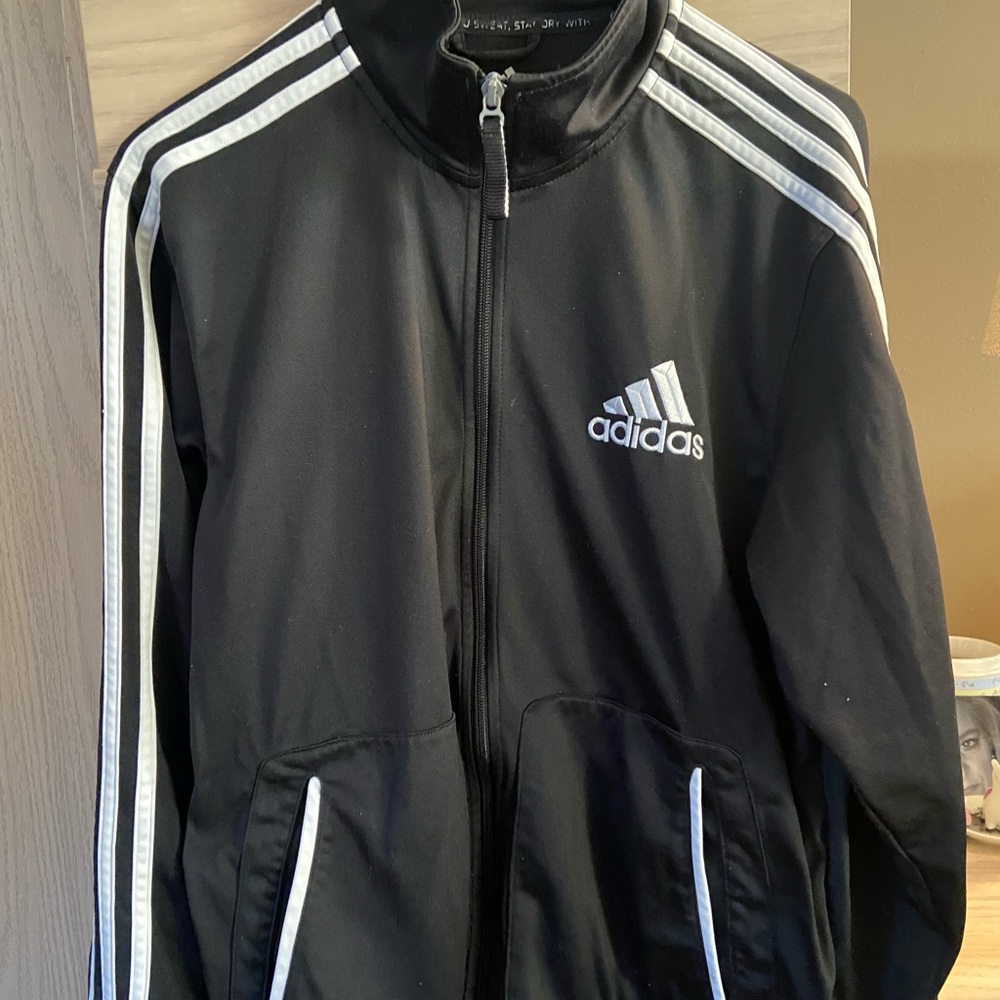 Adidas Black and white zippered sweat jacket.